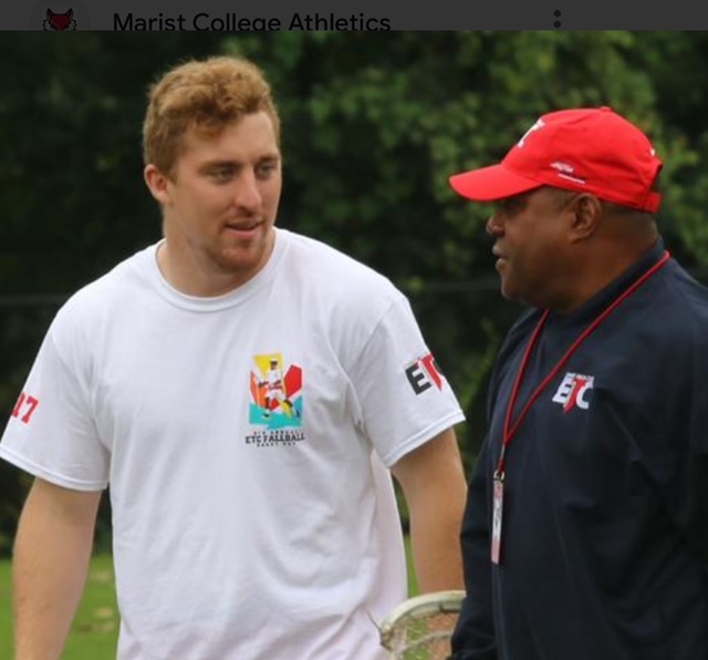 Two men having a conversation while walking